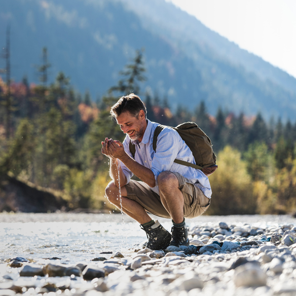 Man by a stream